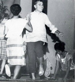 Terry Marshall and Alma Aletin dancing the Tinikling